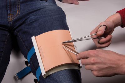 Suture pad holder for simulation patients