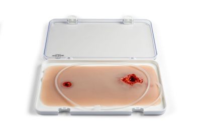 Wound moulage bullet hole, leg with bleeding function