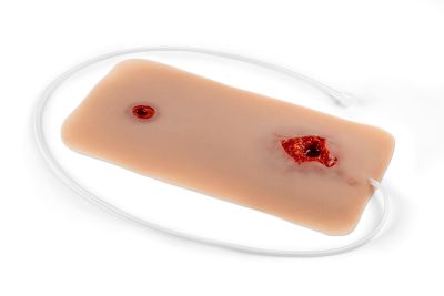 Wound moulage bullet hole, leg with bleeding function